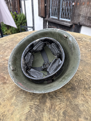 A lovely 1952 dated British army turtle helmet with liner. Liner size 7 1/4.