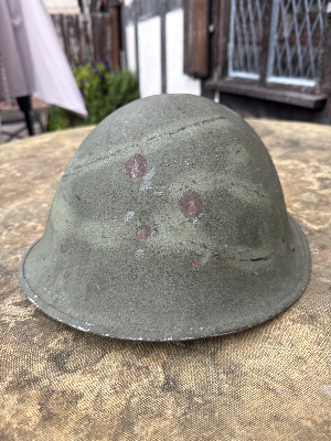 A lovely 1952 dated British army turtle helmet with liner. Liner size 7 1/4.