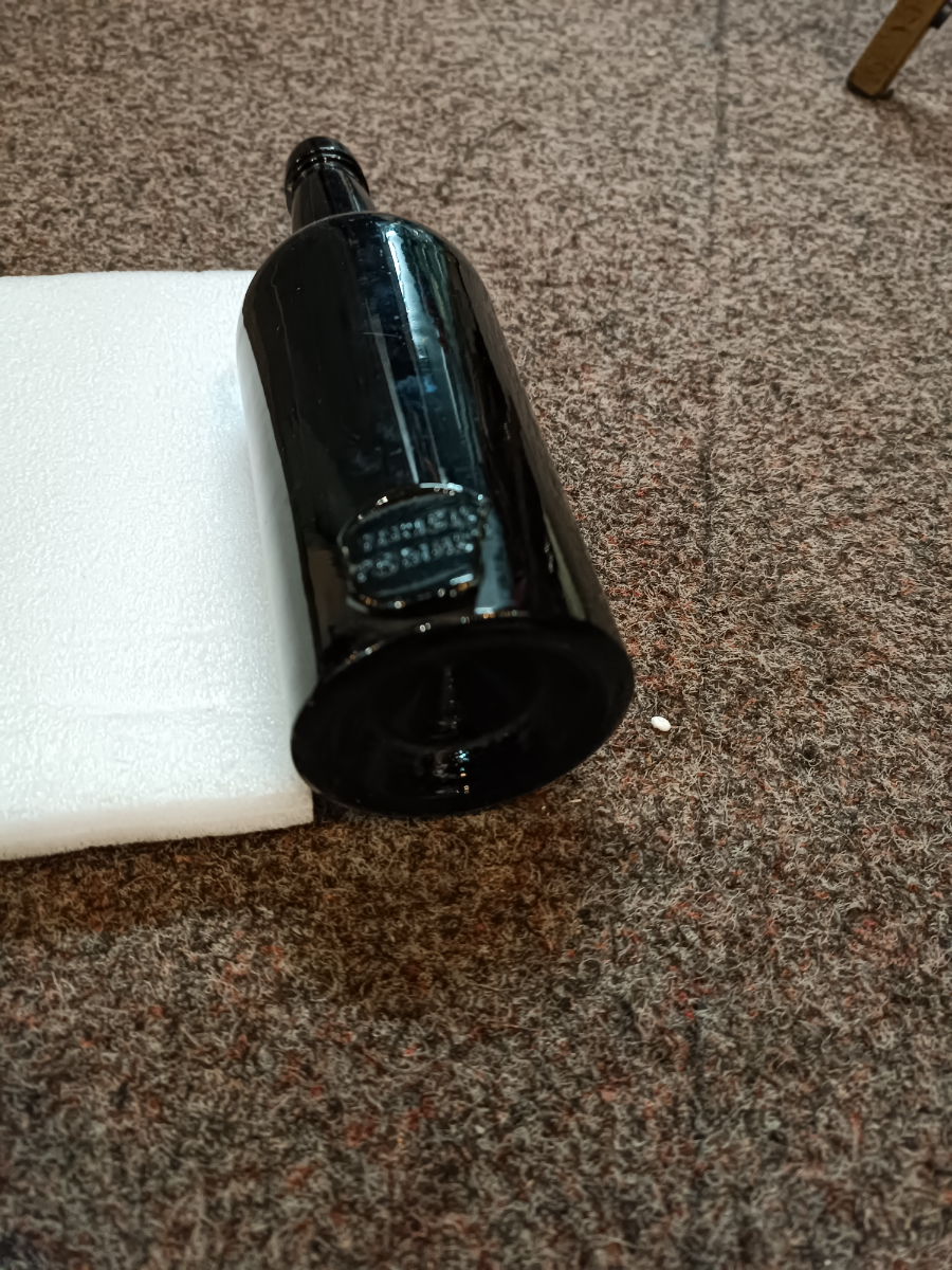 Explore our collection of 19th-century sealed moulded bottles. Featured: Inner Temple standing at 23cm high. In good condition for its age. Shop now!