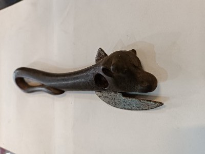 Discover our unique bully beef cast iron can opener from 1865-1938. No visible markings, 18cm long. Shop our collection now for this piece of history.