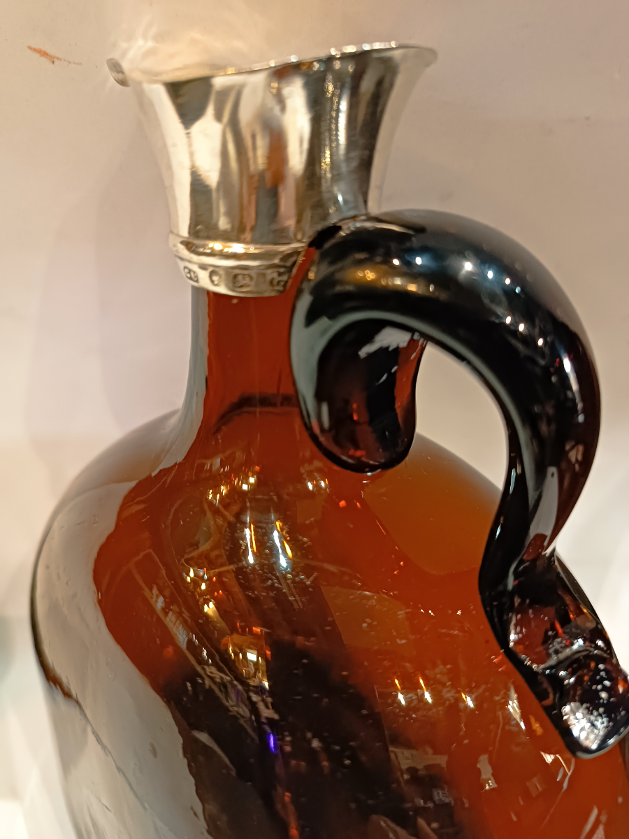 Discover our exquisite 19th-century claret jug with a hallmarked silver top from Birmingham 1862. Shop for antique treasures today and enrich your collection!