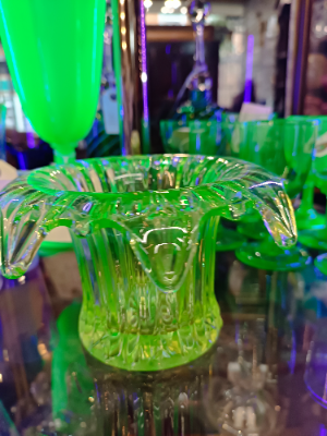 Discover our collection of 19th century uranium glass bowls. This stunning piece, with its unique light yellow/green hue and dash of history, is waiting for you. Shop now!