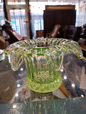 Discover our collection of 19th century uranium glass bowls. This stunning piece, with its unique light yellow/green hue and dash of history, is waiting for you. Shop now!