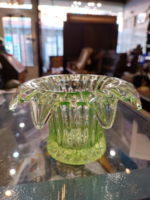 Discover our collection of 19th century uranium glass bowls. This stunning piece, with its unique light yellow/green hue and dash of history, is waiting for you. Shop now!