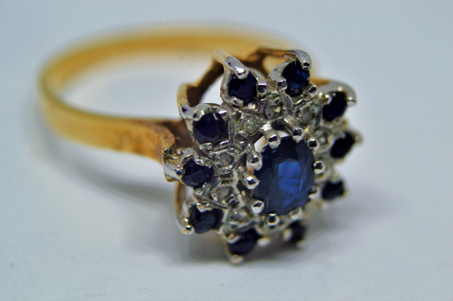 Primary image for Discover vintage elegance with our 9ct gold ring, featuring a sapphire & diamond cluster. Hallmarked London 1978. Shop now for unique, timeless luxury!