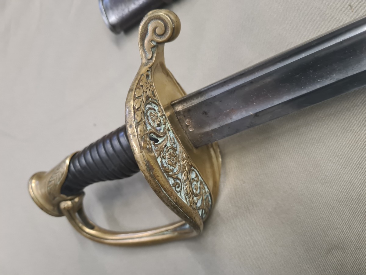 Explore our collection of 20th Century French Model 1845/55 Infantry Officer's Swords. Made in 1915, features a 77cm steel blade and intricate brass hilt. Shop now!