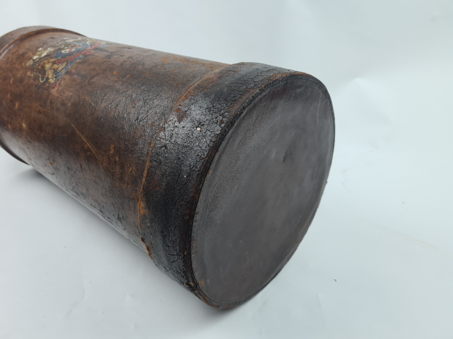 Discover our unique 20th century leather cordite carrier, adorned with an unknown coat of arms. Brilliant in condition despite minimal fraying. Shop now to add to your collection!