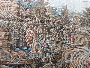 A 20th century Tapestry depicting a couple in ideallic landscape with lining.  It has loops on top for hanging on the wall.  Size 120 x 65 cm.