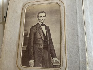 Rare opportunity to own this rare family album with the very rare photo of this most famous american president amongst the family album, purchased long ago from a quaint old junk shop in the county of norfolk england, the photos are from the early part of the 19th century