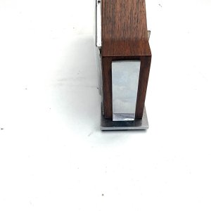Nice time piece, teak wood cased with chromed fittings, eight day mechanical movement possibly swiss, condition overall is excellent and keeps excellent time length 23 cm height 14 cm depth 5 cm,