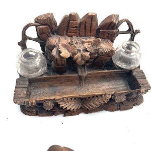 Absolutly stunning carving of this mid victorian pen holder twin inkwell with mushroom tops in very good condition,