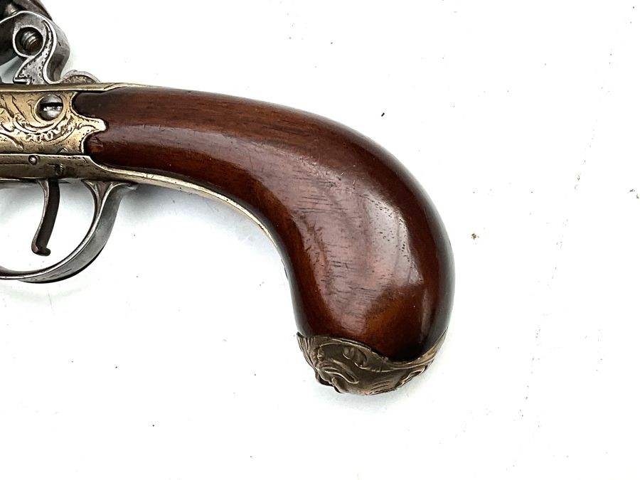 An 18th Century Flintlock Queen Anne-type Greatcoat Pistol By I Parr, London.