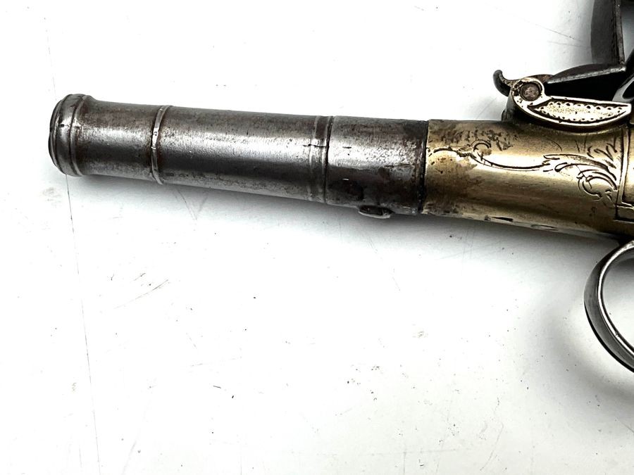 An 18th Century Flintlock Queen Anne-type Greatcoat Pistol By I Parr, London.