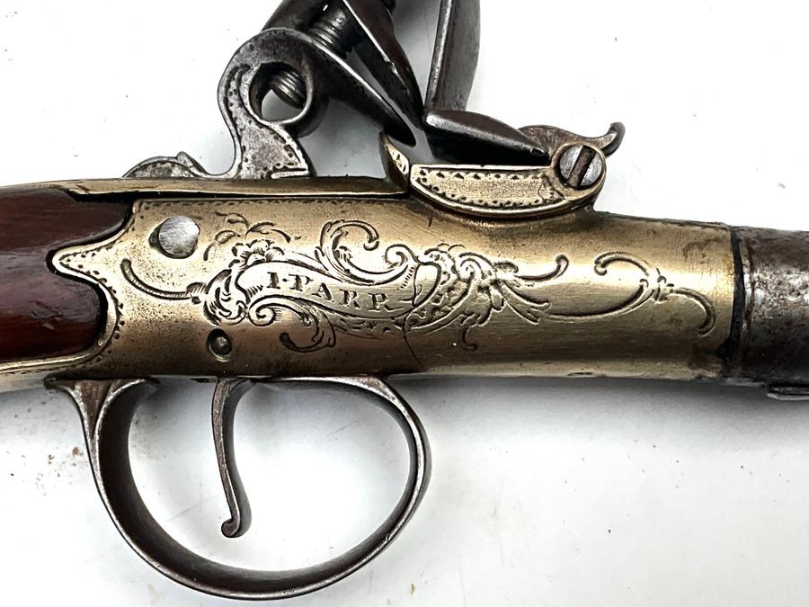 An 18th Century Flintlock Queen Anne-type Greatcoat Pistol By I Parr, London.