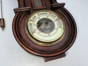 Lovely proportion wall clock in good working order and condition comes with original pendulum and key, length being 53 width of 22 cm depth being 12 cm
