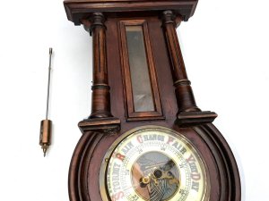 Lovely proportion wall clock in good working order and condition comes with original pendulum and key, length being 53 width of 22 cm depth being 12 cm