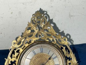 Beautiful little clock, 8 day mechanical open escapement movement in perfect working order, nice dial condition of alls excellent stands when leaning on bracket 15 cm width of 12 cm at base 7 cm,
