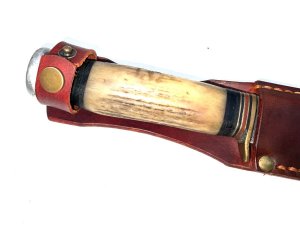 Mid victorian has new scabbards as old fell to pieces with age, horn handle heavy blade a real knife for the frontier, length of 33 cm in total,