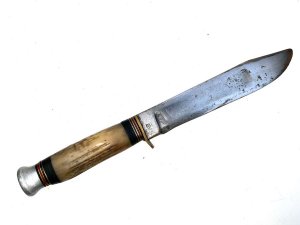 Mid victorian has new scabbards as old fell to pieces with age, horn handle heavy blade a real knife for the frontier, length of 33 cm in total,