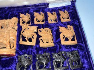 Fantastic carved ebony and sandalwood figures, comes complete and in their original box length of which is 48 cm width of 27 cm height being 7 cm. Material is faded on top, fantastic investment on this still practical commodity offering free delivery worldwide reference swr. Tel: we accept online payments for all our items listed: bank transfer cash on collection or if wishing over the phone using your debit or credit cards, also doing layby payments plan, or email giving your address details & contact number and we shall send you your items invoice to make
