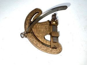 Tool in its original mahogany box, both box and instrument are in good condition though box missing the bottom nob sizes of box are height 15 cm length 17 cm depth being 12 cm,