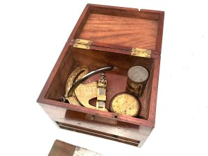 Tool in its original mahogany box, both box and instrument are in good condition though box missing the bottom nob sizes of box are height 15 cm length 17 cm depth being 12 cm,