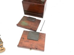 Tool in its original mahogany box, both box and instrument are in good condition though box missing the bottom nob sizes of box are height 15 cm length 17 cm depth being 12 cm,