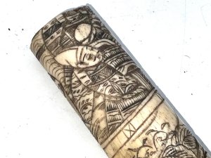 Superbly carved with intricate japanese scenes comes this tanto knifes handle, not perfect but restored will be unbelievable, having length of 129 mm width across being 35 mm de-th of 26 mm,