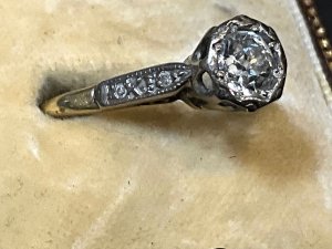 Stunning vintage ring, the diamonds superb, approximately one full carat in 18 carat gold & platinum ring, sized m-n condition is superb, comes in original presentation box