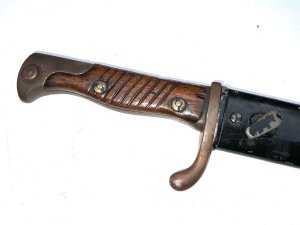 In good condition rare makers and very low serial numbers, total length of 52 cm across guards 7.5 cm depth being 2.5 cm,