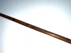 Stunning stick, partridge wood, 18 ct gold plated parts with enamelled top and high tension steel blade, condition of which is very good, late victorian. Firm strong and sturdy, length of 92 cm width across the enamel tops 3.5 cm and sticks diameter from top 1.5 cm tapering down to ferrule 1.4 cm, from the steel tip to the top of the enamel grips 91 cm,