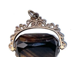Superb revolving gold with large semi precious stone, offering free uk delivery, reference drc3
