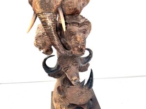 Super mid victorian carving of the mammals that live on the plains of the serengeti, carved from solid wood brought back to uk by south african, stands 58 cm width 22 cm depth 20 cm,