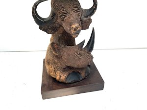 Super mid victorian carving of the mammals that live on the plains of the serengeti, carved from solid wood brought back to uk by south african, stands 58 cm width 22 cm depth 20 cm,