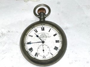 Good sized heavy quality mans pocket watch, comes in working order, will need a good clean and service, 6 cm diameter dial is good as is glass, both needing a polish and clean, the robust case is not silver hallmarked consider owner was a soldier,