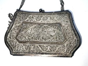Solid silver filigree designs that are quite stunning, very heavy comes in very good condition sizes being 14 cm in length stands 10 cm high depth being 25 mm and weights 283 grams,