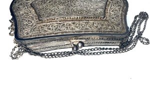 Solid silver filigree designs that are quite stunning, very heavy comes in very good condition sizes being 14 cm in length stands 10 cm high depth being 25 mm and weights 283 grams,