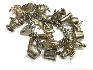 Superb ladies charms bracelet all in solid silver, comes in excellent condition vintage item, still retains the safety chain too, offering free delivery worldwide reference drc5 tel: we accept online payments for all our items listed: bank transfer cash on collection or if wishing over the phone using your debit or credit cards, also doing layby payments plan, or email giving your address details & contact number and we shall send you your items invoice to make