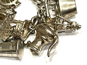 Superb ladies charms bracelet all in solid silver, comes in excellent condition vintage item, still retains the safety chain too, offering free delivery worldwide reference drc5 tel: we accept online payments for all our items listed: bank transfer cash on collection or if wishing over the phone using your debit or credit cards, also doing layby payments plan, or email giving your address details & contact number and we shall send you your items invoice to make