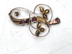 Vintage item stamped for 9ct rose gold, beautiful rubie stones at least half a carat combined, stands 4 cm high width being 2.6 cm