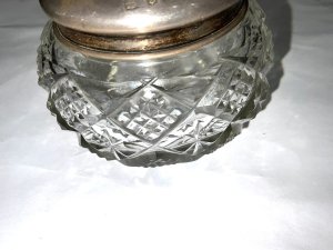 Super old jar for rings and trinkets for a lady’s dressing table, hallmarked on the top for birmingham 1920 overall glass in very good undamaged condition the tops has odd ding but still presentable top on own weighs 13grams, jar stands 7 cm diameter being 8 cm, reference sb.