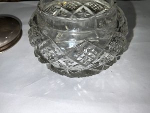 Super old jar for rings and trinkets for a lady’s dressing table, hallmarked on the top for birmingham 1920 overall glass in very good undamaged condition the tops has odd ding but still presentable top on own weighs 13grams, jar stands 7 cm diameter being 8 cm, reference sb.