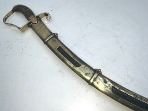 British light sabre of the late 18th century, this sword was presented to a british officer  the inscription's on the hilt of the scabbard states capt a morris to lt l r gibbs 1799, overall conditions quite good blades a little tarnish but will clean up great, length of 90 cm height 14 cm depth 3 cm,