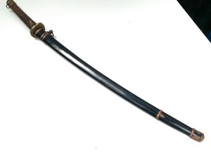 Japanese high quality naval sword. Family silver crest emblem kamon potentially linked to higashikuni no- miya branch of the imperial family. The signed tang sword in 2ww mounts blades exceptional and in reasonable japanese polish has one nick to cutting edge see pictures, total length of 98 cm width 7cm depth 6 cm, reference 8. Tel: we accept online payments for all our items listed: bank transfer cash on collection or if wishing over the phone using your debit or credit cards, also doing layby payments plan, or email giving your address details & contact number and we shall send you your items invoice to make