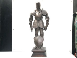 An impressive early 19th half sized suit of armour in the 16th century style, the helmet is adjustable, the suit of armour has detailed engraving throughout and includes coat of arms on the armour, supported on a moulded edge wooden plinth base, all in great condition and standing 97 cm high width 40 cm depth 22 cm circa 1820. Tel: we accept online payments for all our items listed: bank transfer cash on collection or if wishing over the phone using your debit or credit cards, also doing layby payments plan, or email giving your address details & contact number and we shall send you your items invoice to make