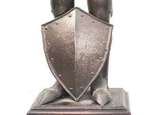 An impressive early 19th half sized suit of armour in the 16th century style, the helmet is adjustable, the suit of armour has detailed engraving throughout and includes coat of arms on the armour, supported on a moulded edge wooden plinth base, all in great condition and standing 97 cm high width 40 cm depth 22 cm circa 1820. Tel: we accept online payments for all our items listed: bank transfer cash on collection or if wishing over the phone using your debit or credit cards, also doing layby payments plan, or email giving your address details & contact number and we shall send you your items invoice to make