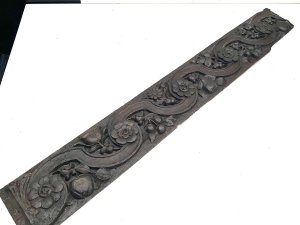 Carved english country floral and nuts possibly acorn or hazel nut in english oak still very hard and firm and no signs of infestation, length of 135 cm width 19 cm depth 3 cm,