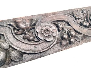 Carved english country floral and nuts possibly acorn or hazel nut in english oak still very hard and firm and no signs of infestation, length of 135 cm width 19 cm depth 3 cm,