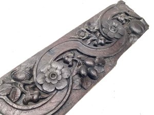 Carved english country floral and nuts possibly acorn or hazel nut in english oak still very hard and firm and no signs of infestation, length of 135 cm width 19 cm depth 3 cm,