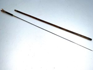 Stunning stick, partridge wood, 18 ct gold plated parts with enamelled top and high tension steel blade, condition of which is very good, late victorian. Firm strong and sturdy, length of 92 cm width across the enamel tops 3.5 cm and sticks diameter from top 1.5 cm tapering down to ferrule 1.4 cm, from the steel tip to the top of the enamel grips 91 cm,